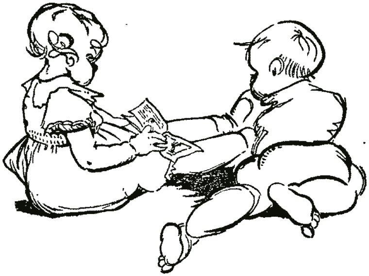 Two small children sitting on the floor reading a book together